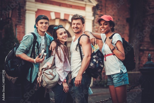 Fényképezés Multiracial friends tourists making selfie in an old city