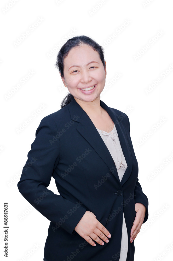 Business woman in black suit smiles at camera Business woman in black suit smiles at camera