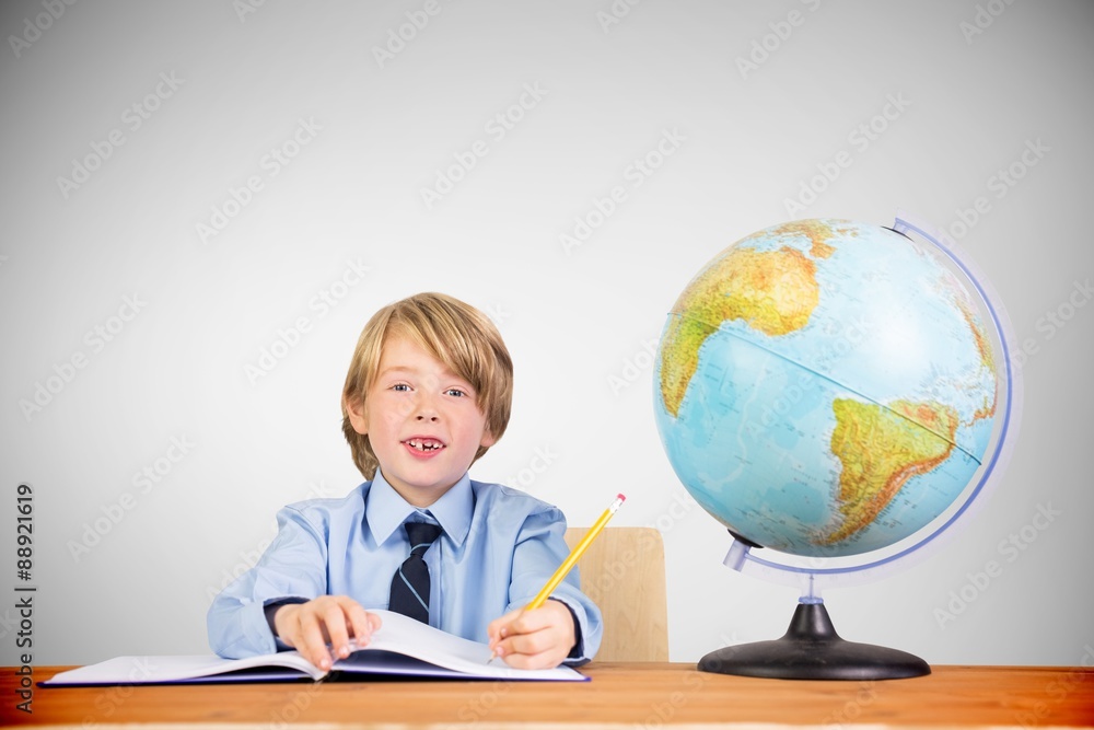 Composite image of cute pupil writing Composite image of cute pupil writing