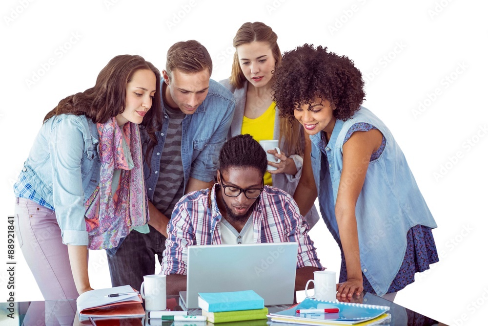 Composite image of fashion students working as a team Composite image of fashion students working as a team