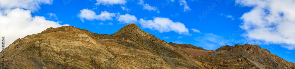 Mountain with clouds sky in Tibet