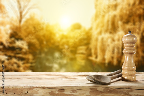 wooden table and autumn day 