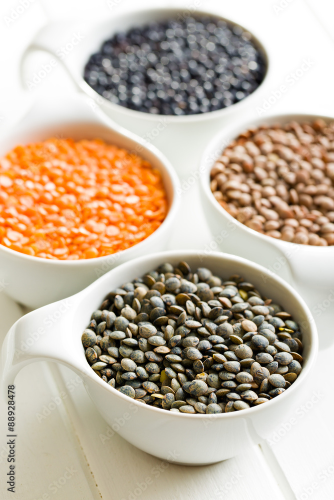 Obraz premium various lentils in ceramics bowls