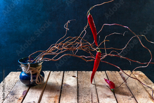 Still Life with tree red peppers