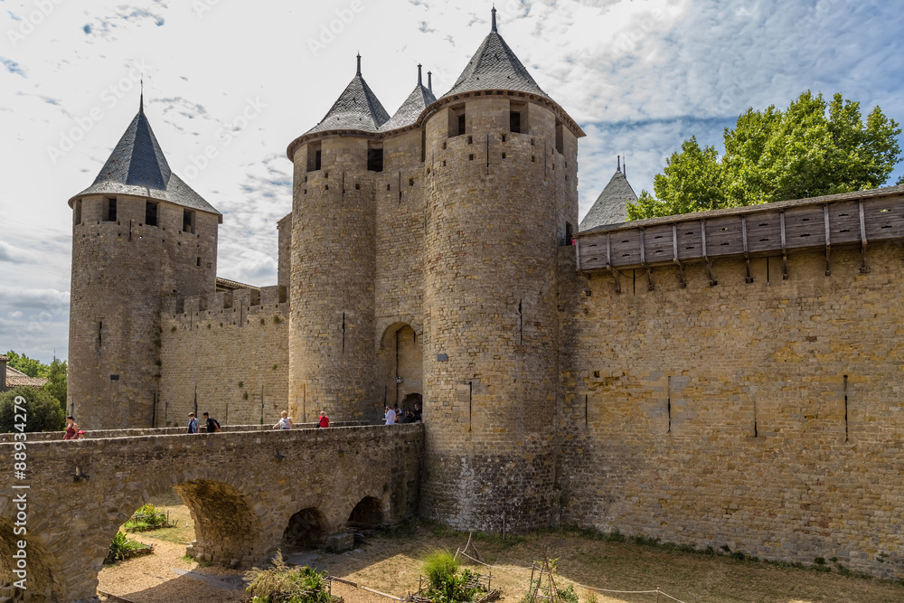 Carcassonne, France. The bridge and the entrance gate of the castle Comtal. Fortress of Carcassonne is included in the UNESCO World Heritage List
