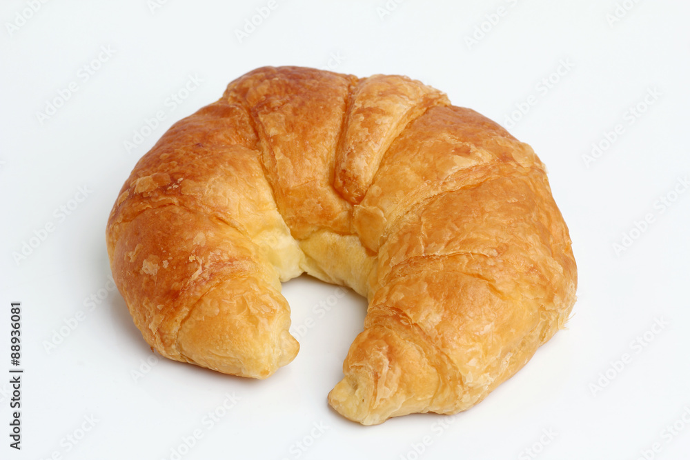 one brown glod croissant