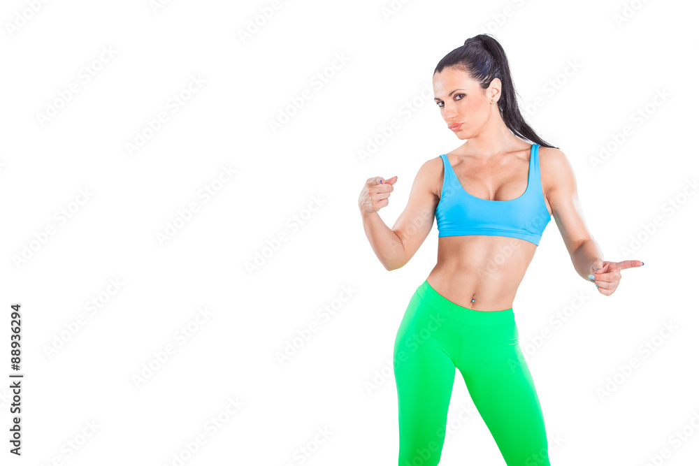 Fit and sexy girl posing in studio. Fit and sexy girl posing in studio.