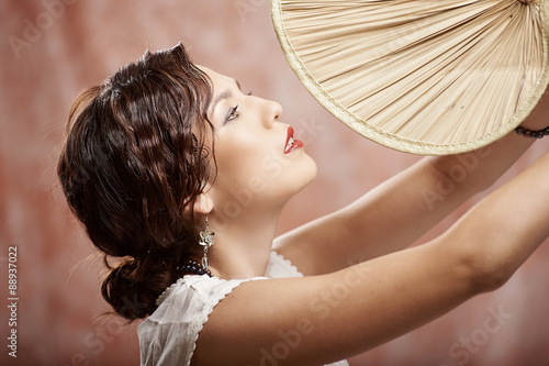 Photos Young girl posing and looking studio portrait vintage style