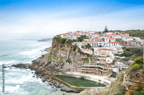 Azenhas do Mar white village landmark on the cliff and Atlantic photo