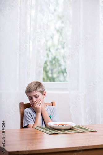 Boy refusing to eat