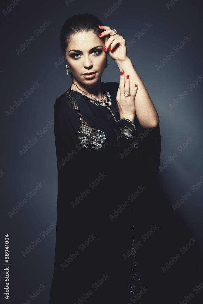 Beautiful girl in the Arab image with bright oriental make-up. Beautiful girl in the Arab image with bright oriental make-up.