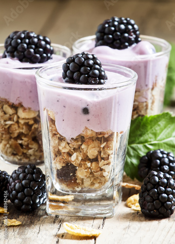 Homemade granola with yogurt and blackberry, healthy breakfast,