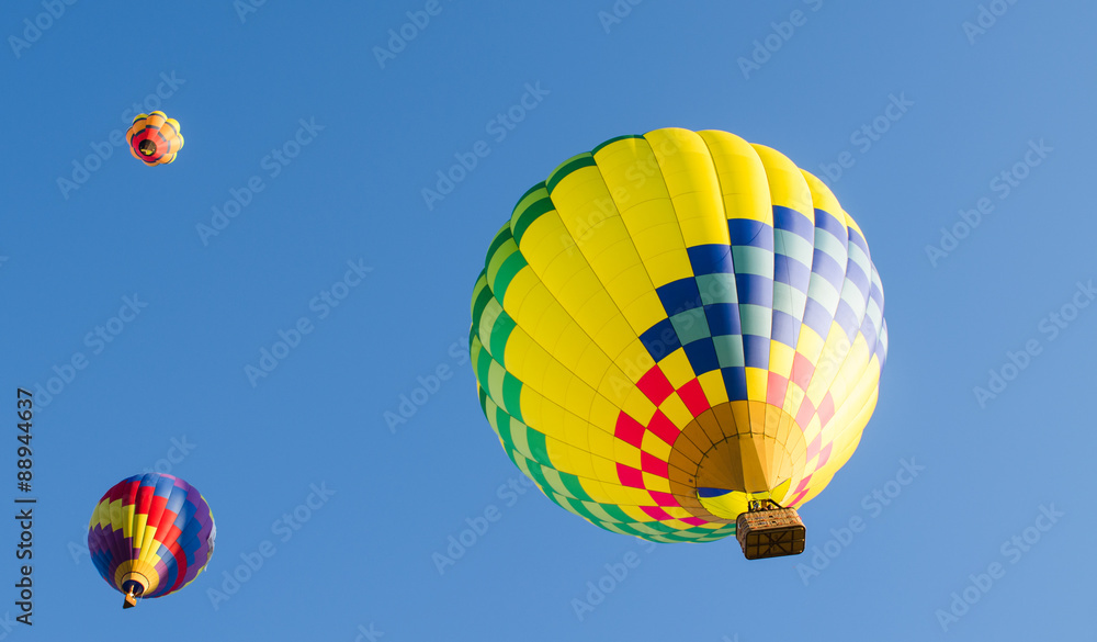 Naklejka premium Hot air balloon in flight