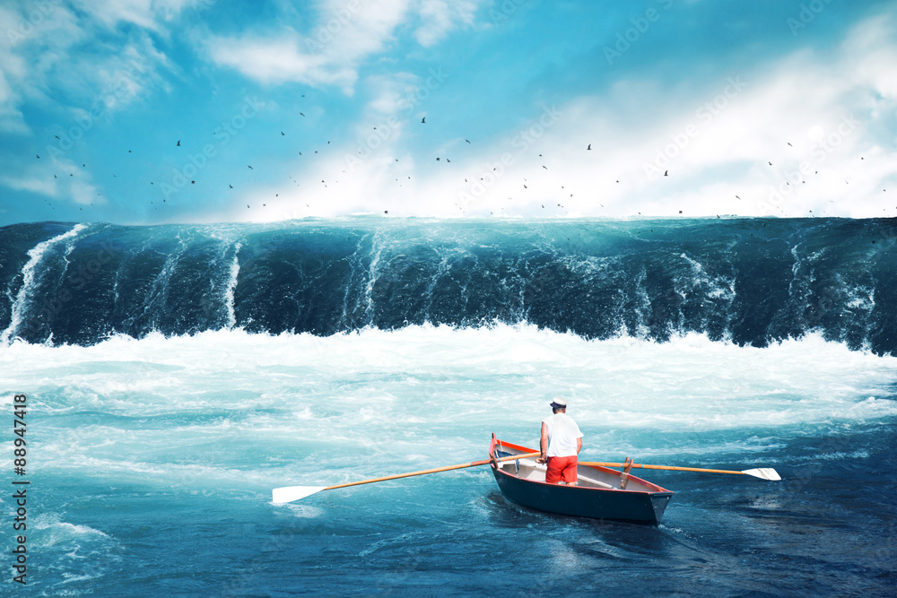 Man on a boat facing tsunami - obrazy, fototapety, plakaty 