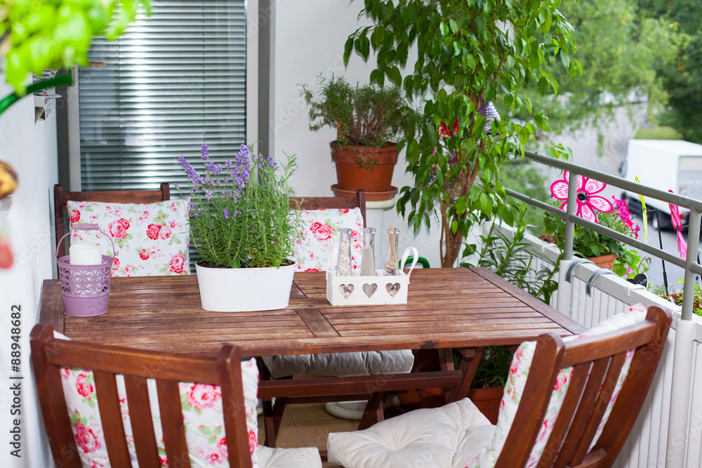 balcony in summer - Balkon im Sommer, Tisch, Stühle, Deko, Lave Stock Photo  | Adobe Stock