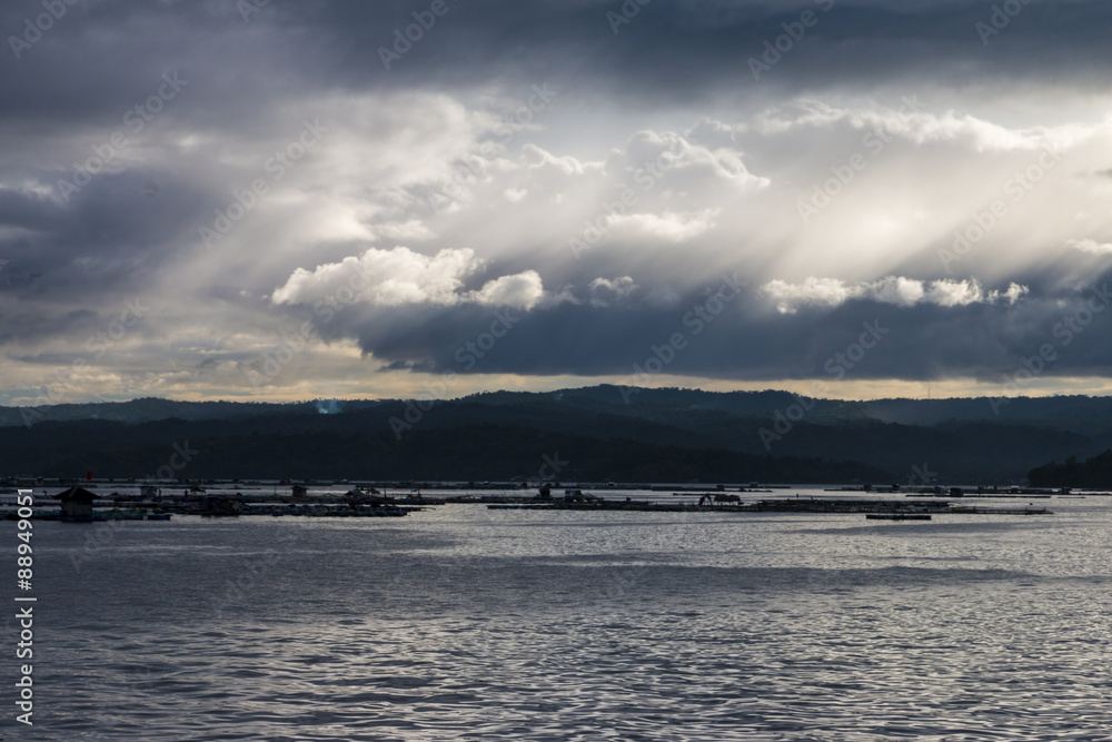 Beautiful dramatic sky with sun rays in the evening