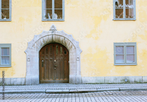 The wooden door in the center of Vasteras city in Sweden © northernland