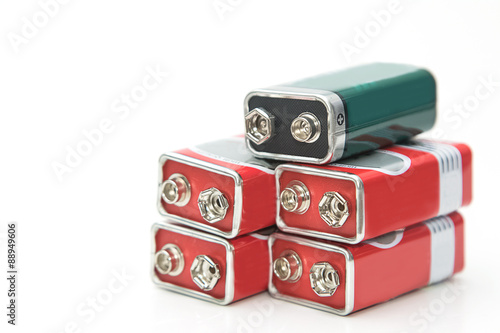 9 V batteries in perspective closeup view on white background photo