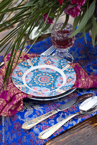 Wedding table arrangement in desert sand of Morocco stile