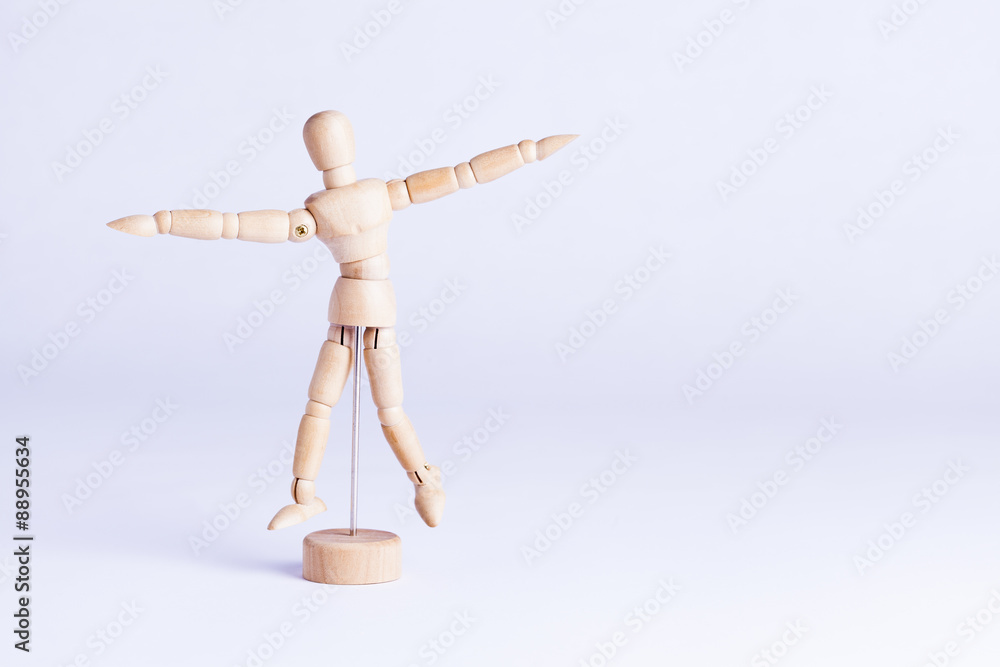wooden mannekin on white background wooden mannekin on white background