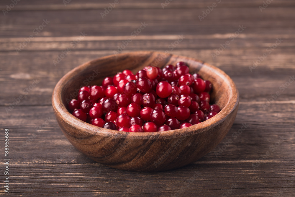 Bowl of cranberries on table