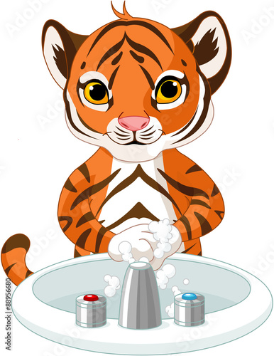 Fototapeta Naklejka Na Ścianę i Meble -  Little Tiger Washing Hands
