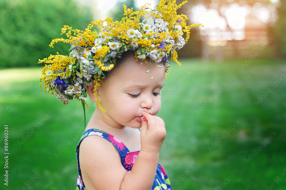 Lovely little baby girl with daisy wreath Lovely little baby girl with daisy wreath