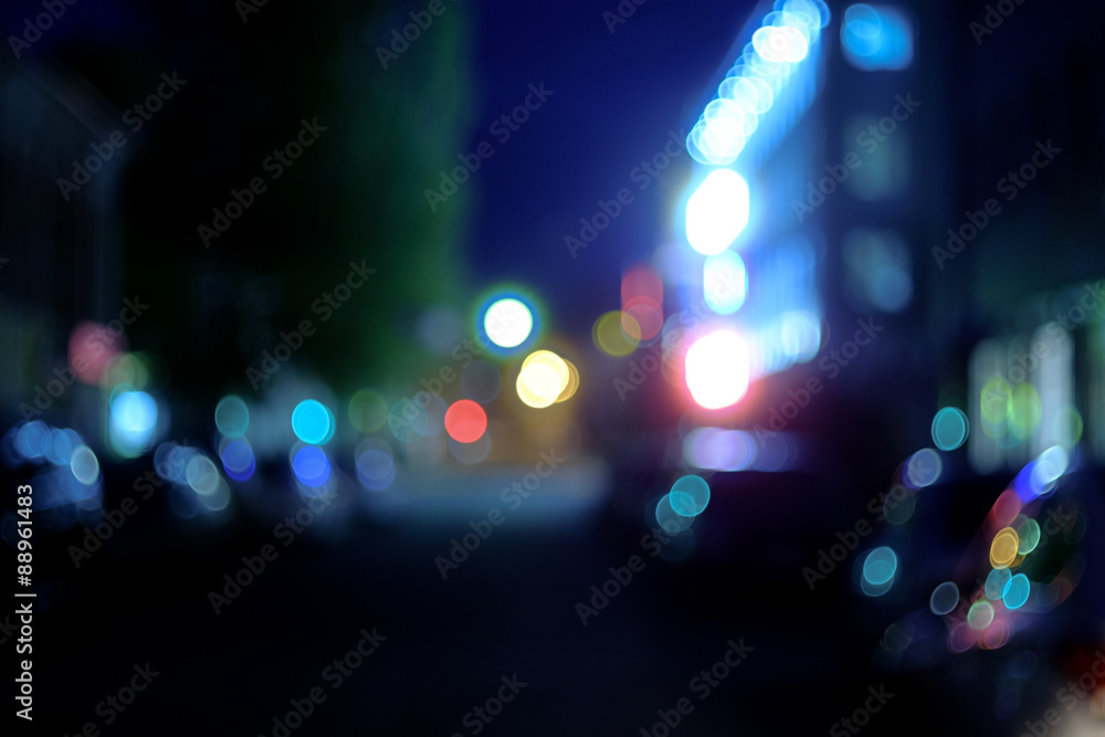 Blurred night street in blue color