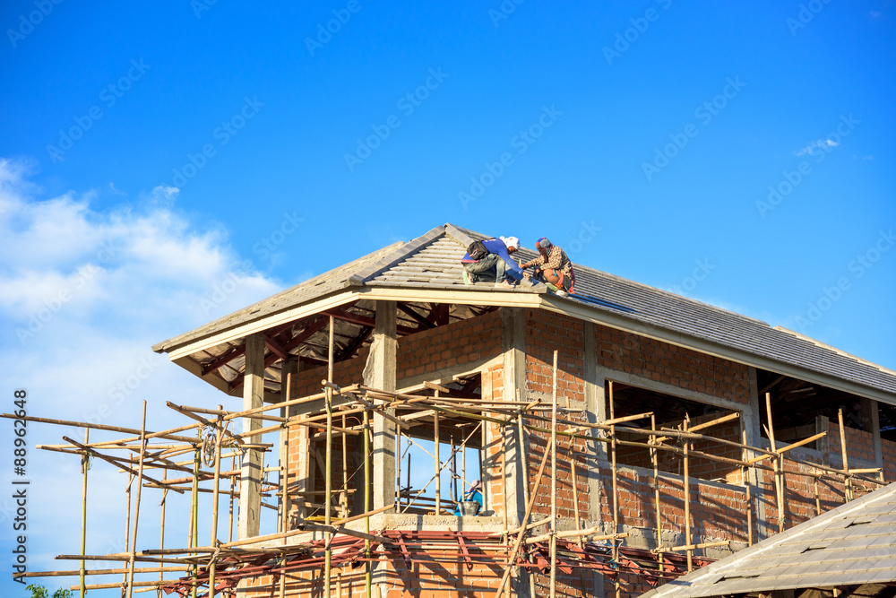 labor working in construction site for roof labor working in construction site for roof