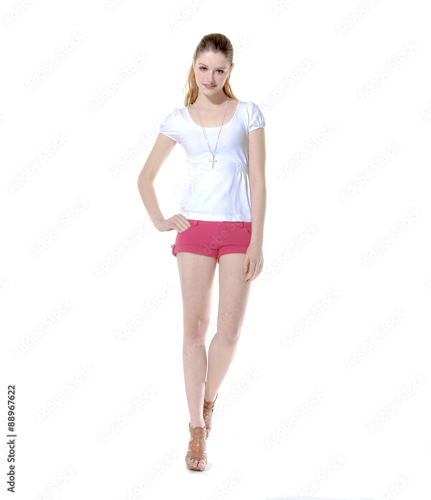 Full body young woman in casual style clothing and denim shorts Full body young woman in casual style clothing and denim shorts