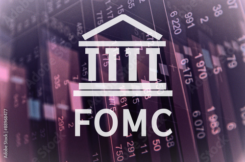 Building icon with inscription FOMC. Financial data on computer screen. Multiple exposure.