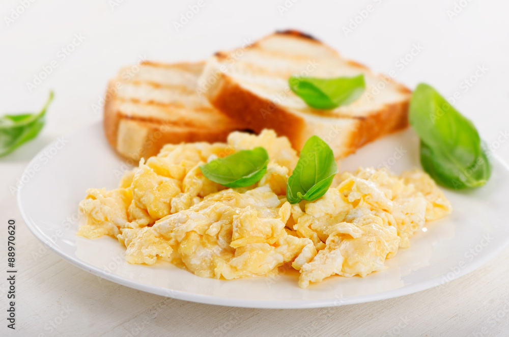 Healthy Breakfast with scrambled eggs and toasts. Healthy Breakfast with scrambled eggs and toasts.