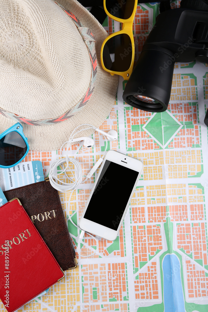 Sunglasses, passport and map, close up. Preparing for travel concept Sunglasses, passport and map, close up. Preparing for travel concept