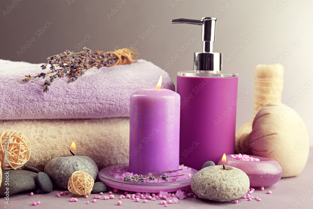 Spa treatments isolated on colorful background. Lavender spa concept Spa treatments isolated on colorful background. Lavender spa concept