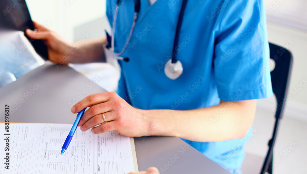 Family doctor spends consultation in the office Family doctor spends consultation in the office
