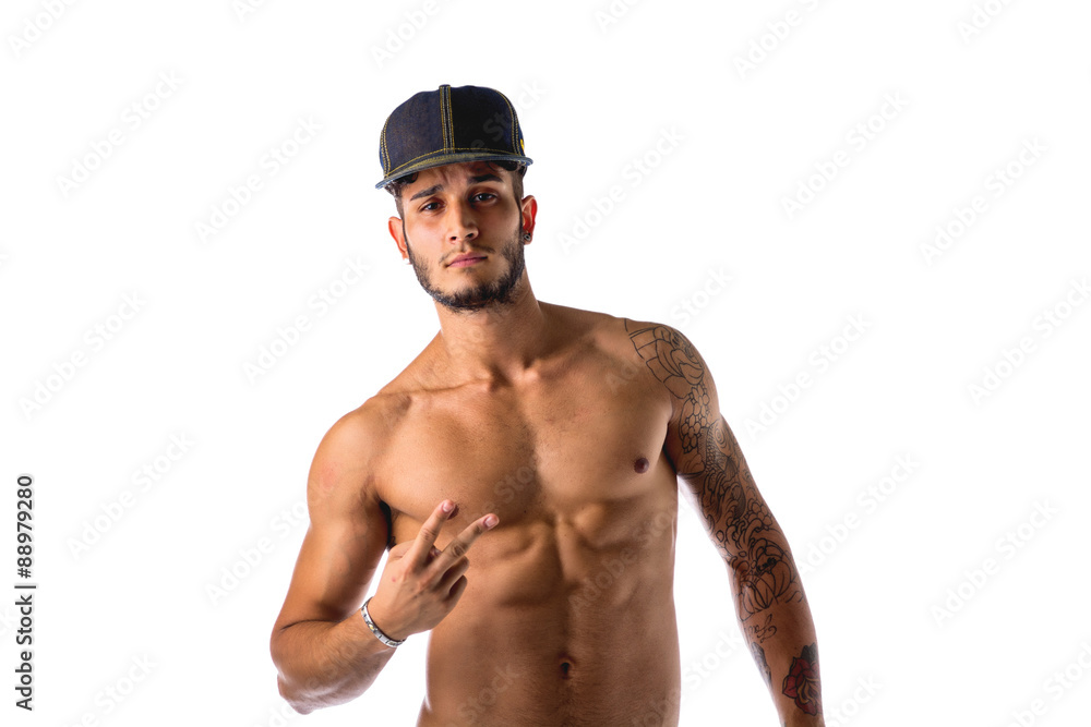 Handsome young man naked, wearing baseball hat in cool pose Stock Photo |  Adobe Stock