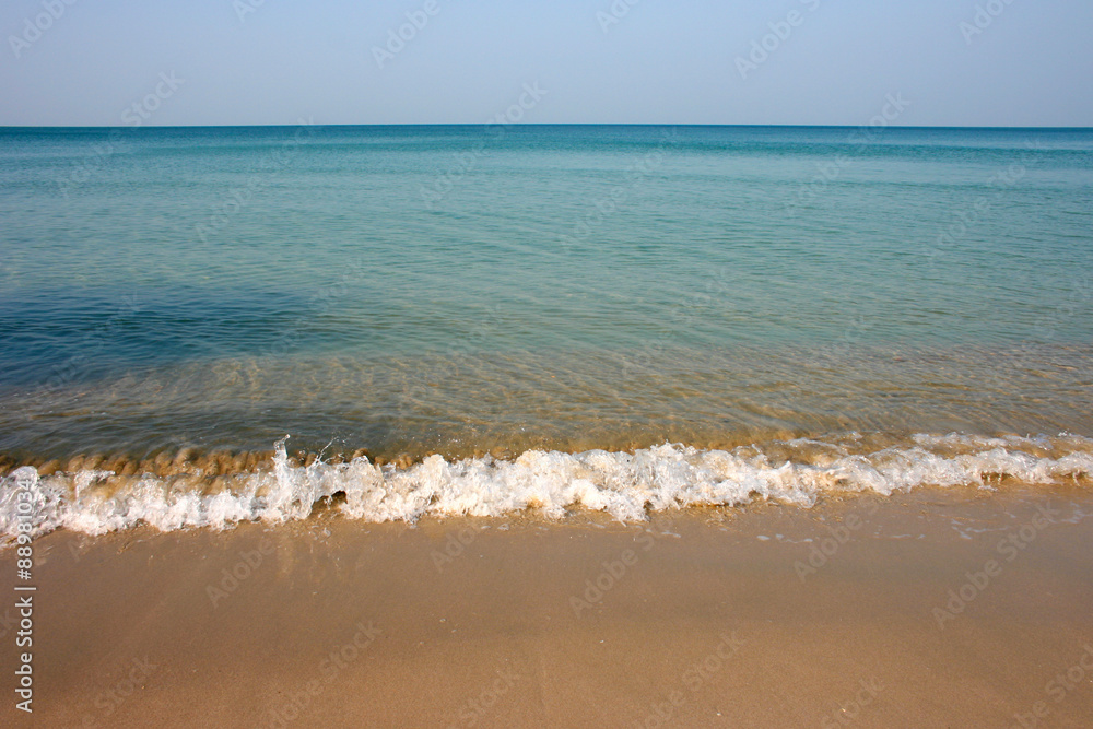 sea with waves and sand