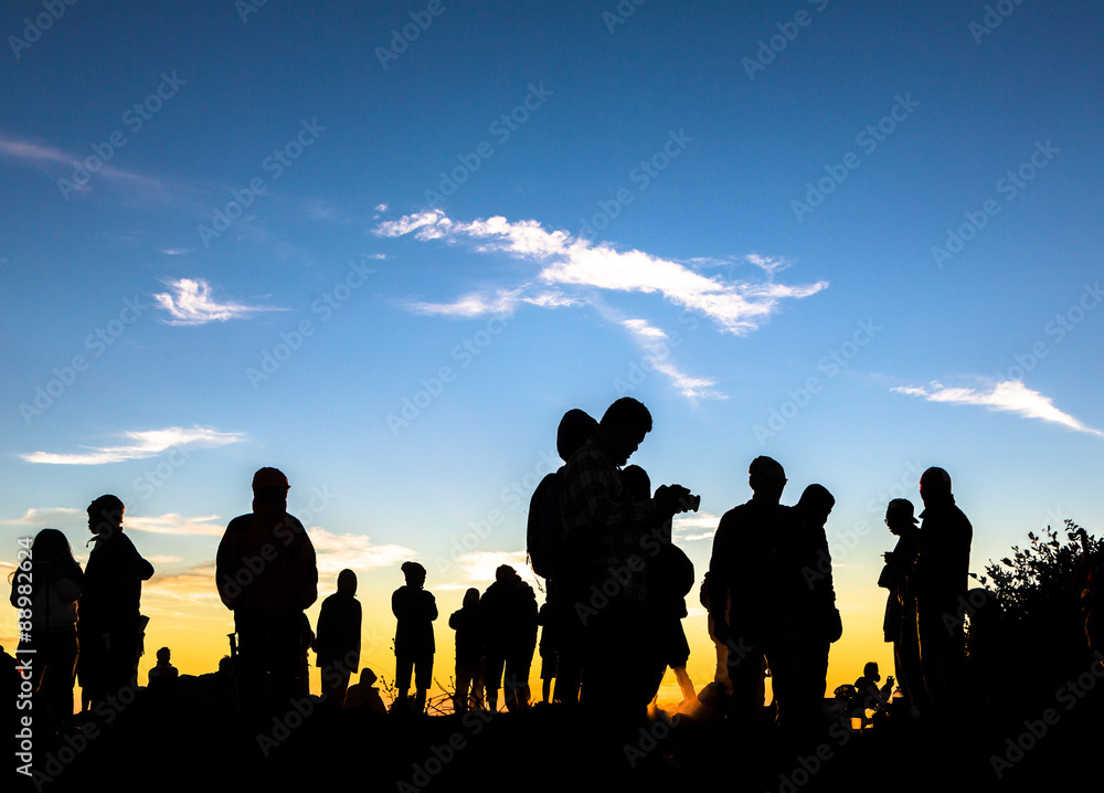 People enjoys the sunrise on the top of Merbabu volcano in Indon