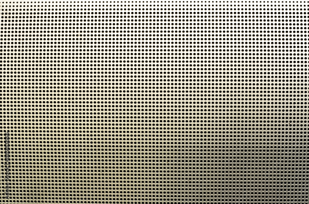 A old gold metallic dot texture background pattern A old gold metallic dot texture background pattern