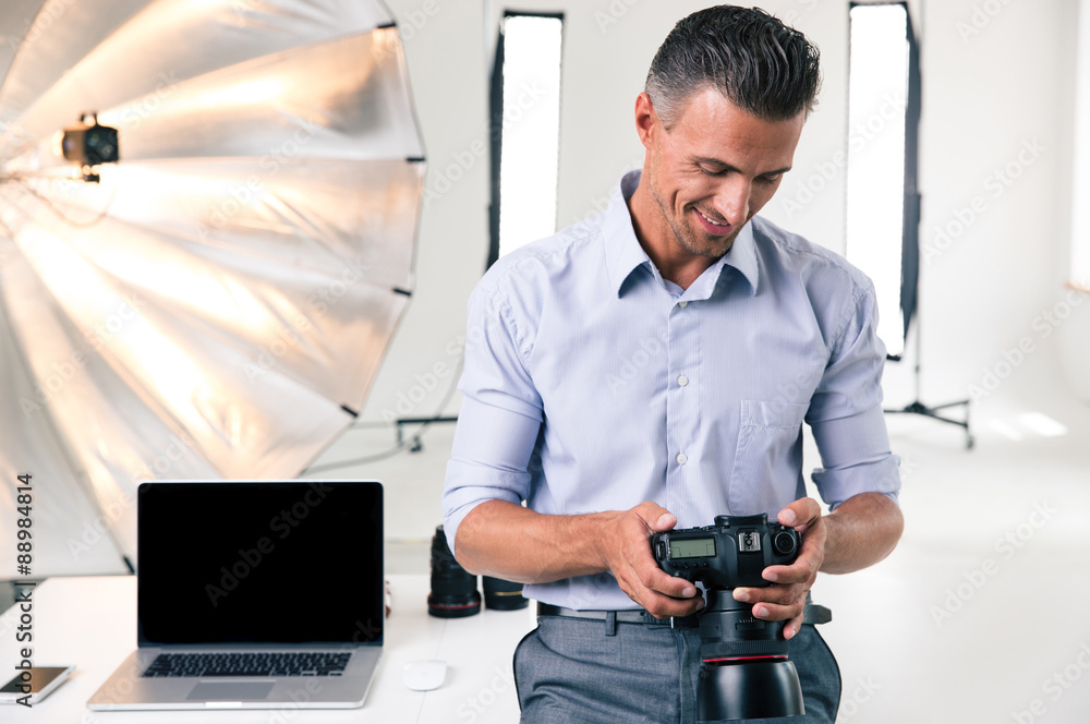 Happy businessman using camera Happy businessman using camera