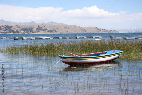Wallpaper Mural Colorful boat on the scenic coast of Titicaca lake in Bolivia, South America Torontodigital.ca