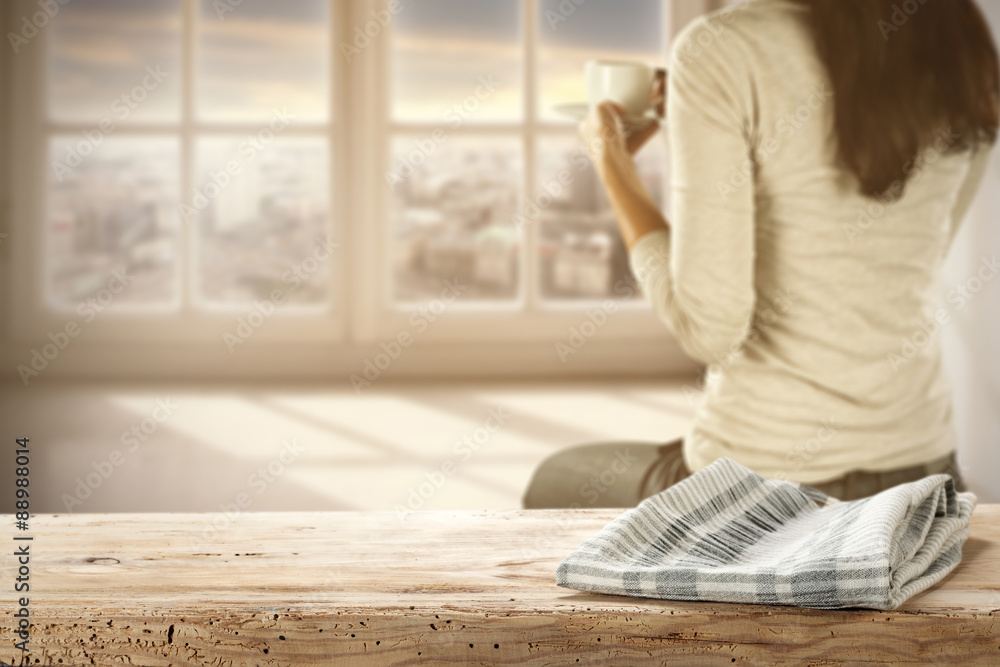 wooden desk space and woman with window sill wooden desk space and woman with window sill