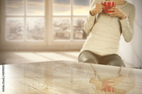 wooden desk space and woman with window sill 