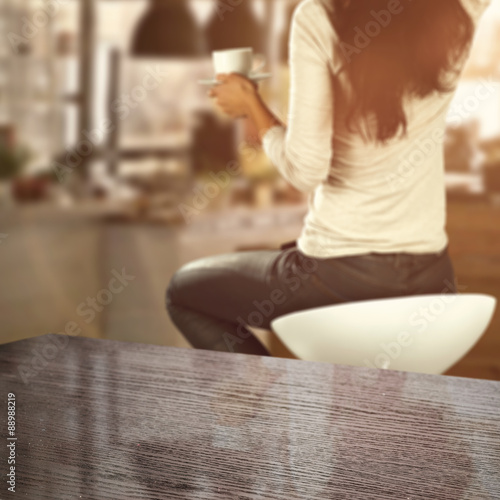 wooden desk space and woman with window sill 