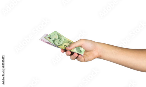 hand holding currency isolated on white background