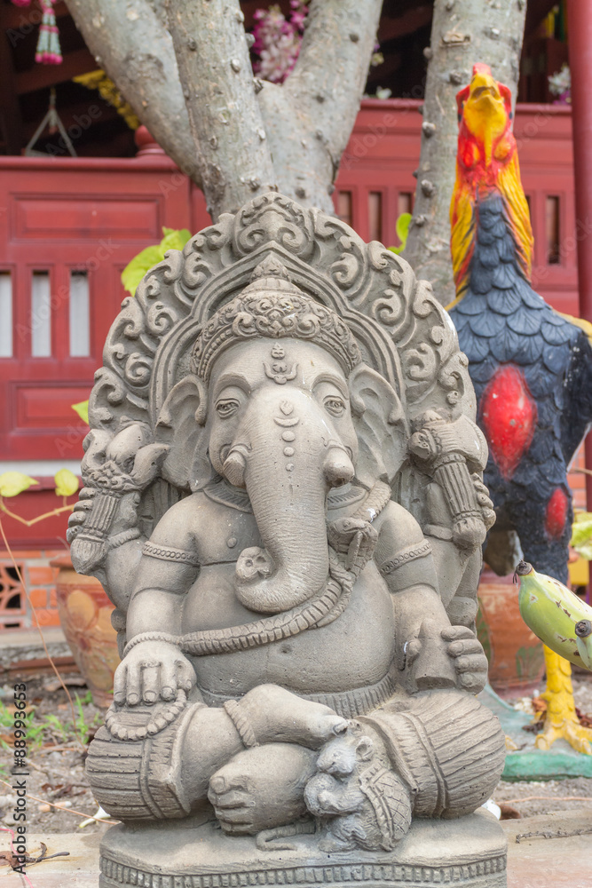 stone carving for Hindu god Ganesha sitting under sunlight