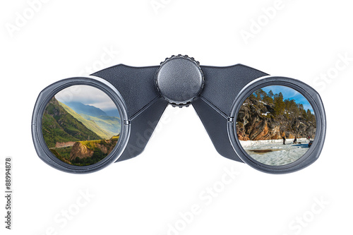Binoculars in glasses which reflect the mountains and frozen sea. © al_1033