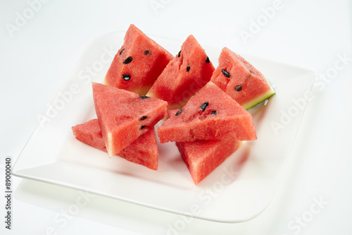 Watermelon set on white plate