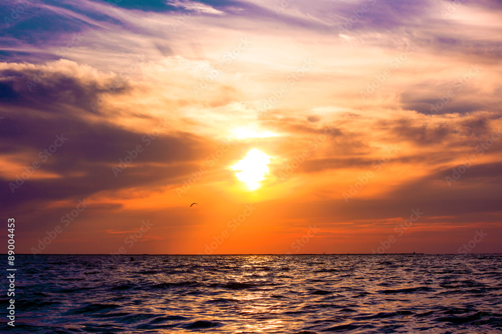 Fototapeta premium Scenic view of beautiful sunset above the sea