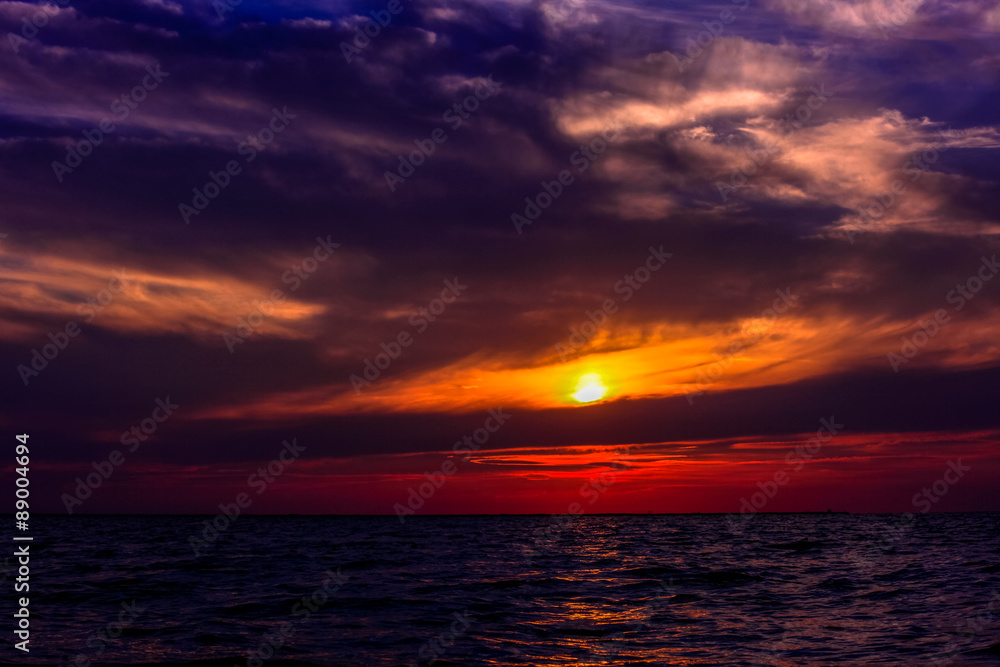 Scenic view of beautiful sunset above the sea in purple colors